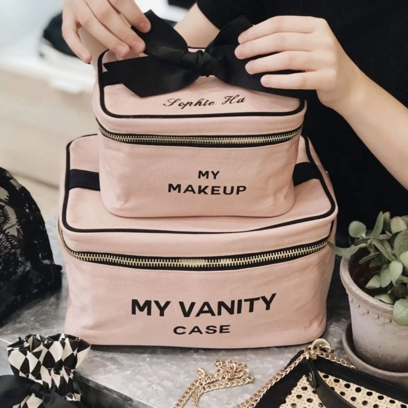 trousse de maquillage rose poudré
